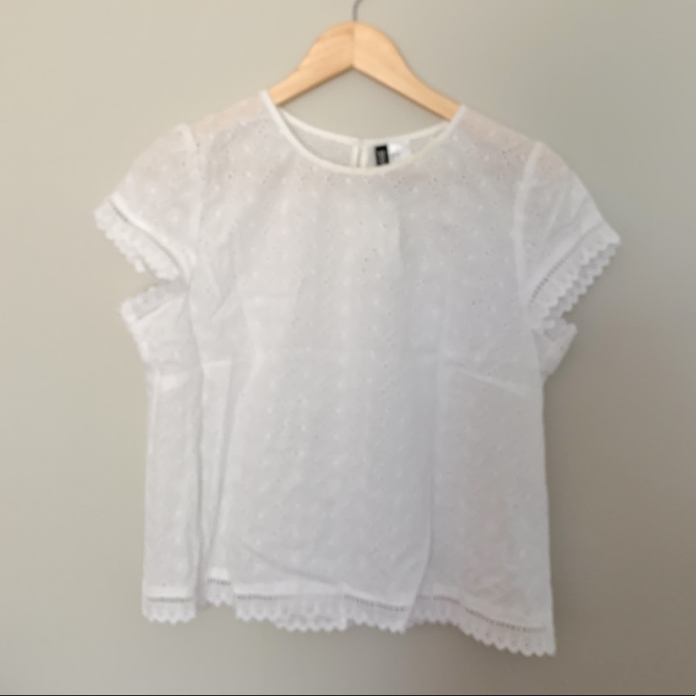 Divided new with tags eyelet top wit button up back